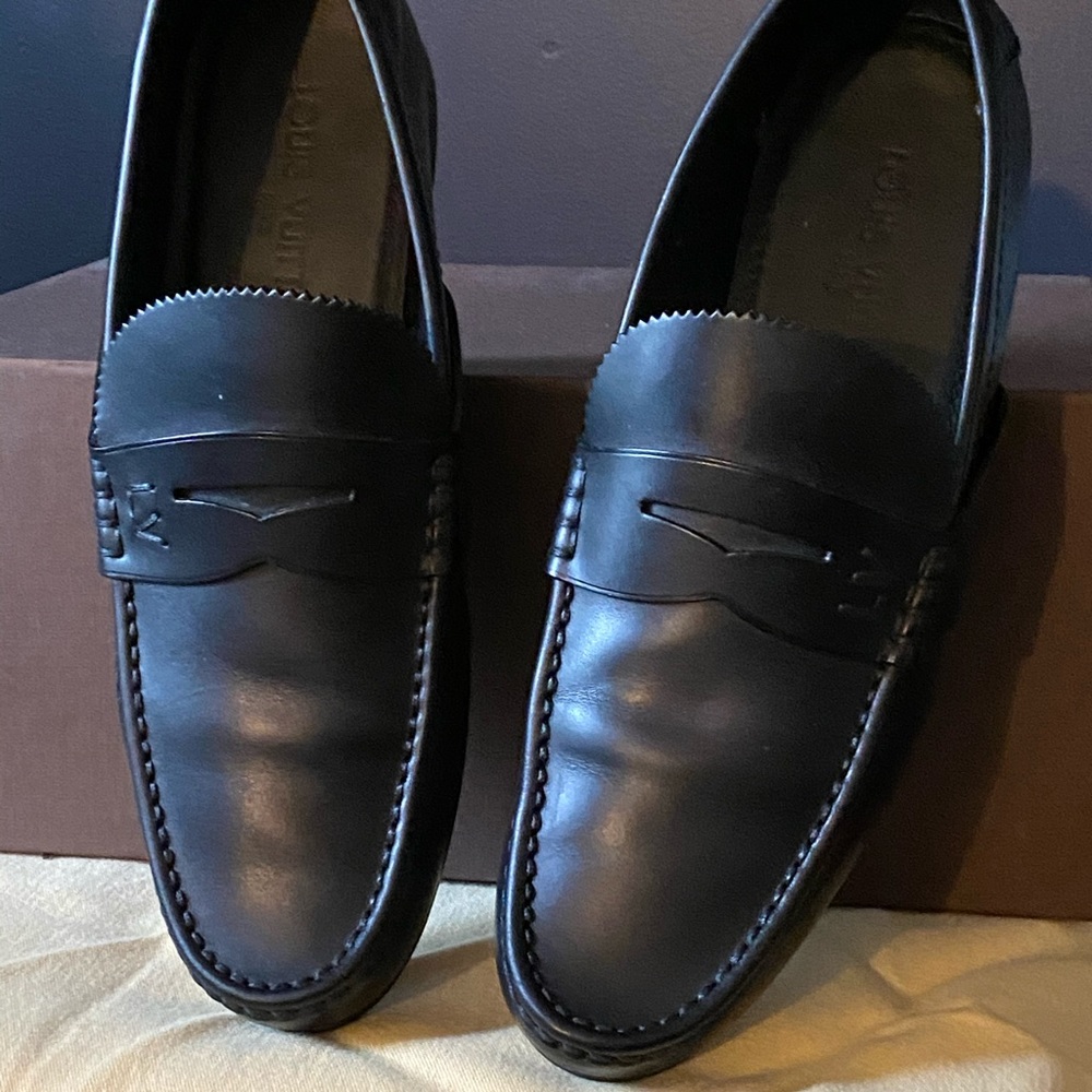 Authentic Louis Vuitton Men’s black leather loafer